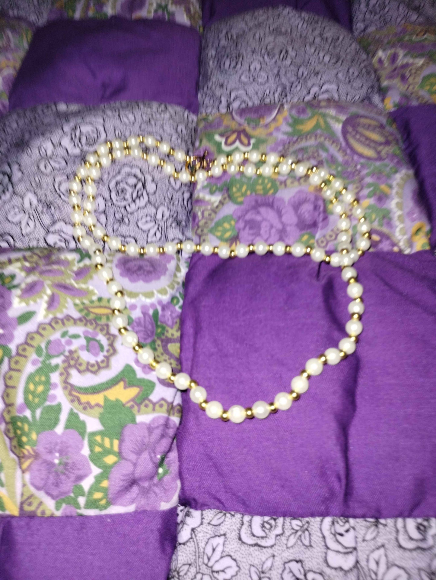 White Pearl Necklace with Gold Spacers.